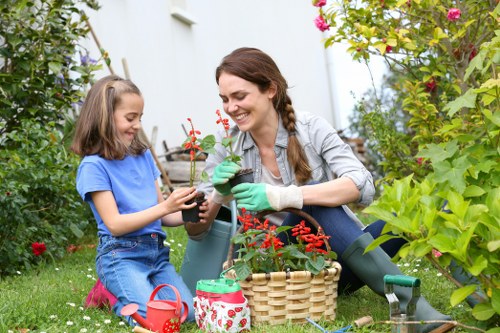 Professional gardeners choosing plants for a Hither Green garden