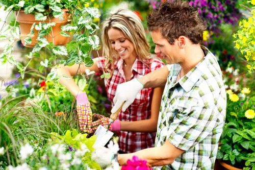 Gardeners working on garden design and landscaping in Totteridge