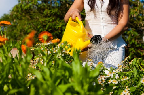 Professional landscaper working on a London garden