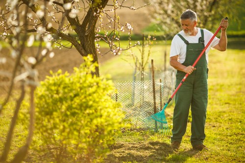 Expert gardeners working in a London residential garden